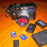 camera bag, two batteries, 3 SD cards